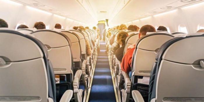 Airplane20full20of20passengers2028329-lMcSAW-rss