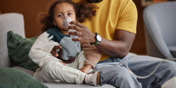 Girl20with20nebulizer20and20her20dad-JjA4tG-rss