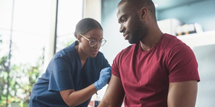 Man20getting20vaccinated-aQO7EW-rss