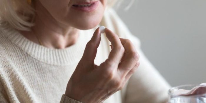 Older20woman20taking20a20white20pill_0-NWnvQ6-rss