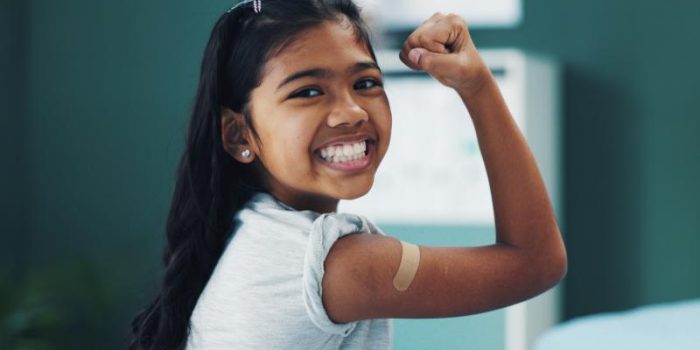 Smiling20girl20with20vax20bandaid-m5bR3e-rss