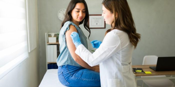 Young20woman20getting20vaccinated-i0m19A-rss