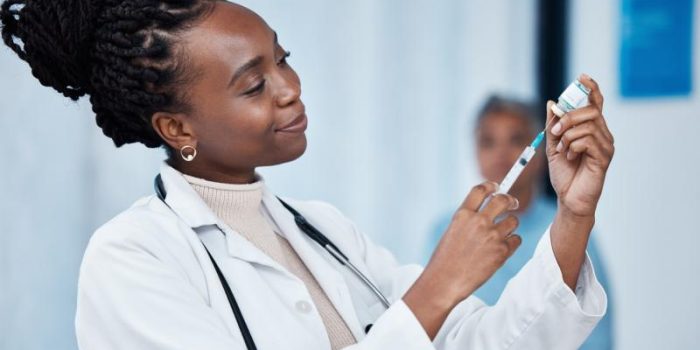 doctor20with20needle20and20vial-l28ckU-rss