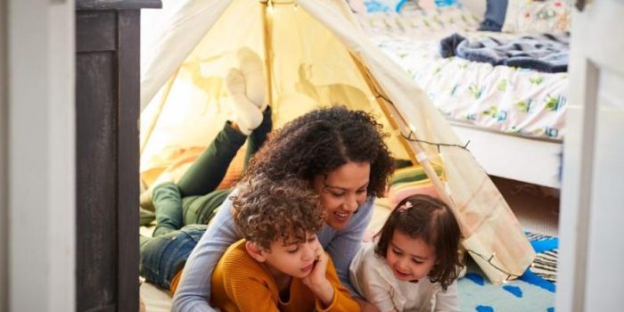 mom_with_kids_in_bedroom_tent-A3tOND-rss